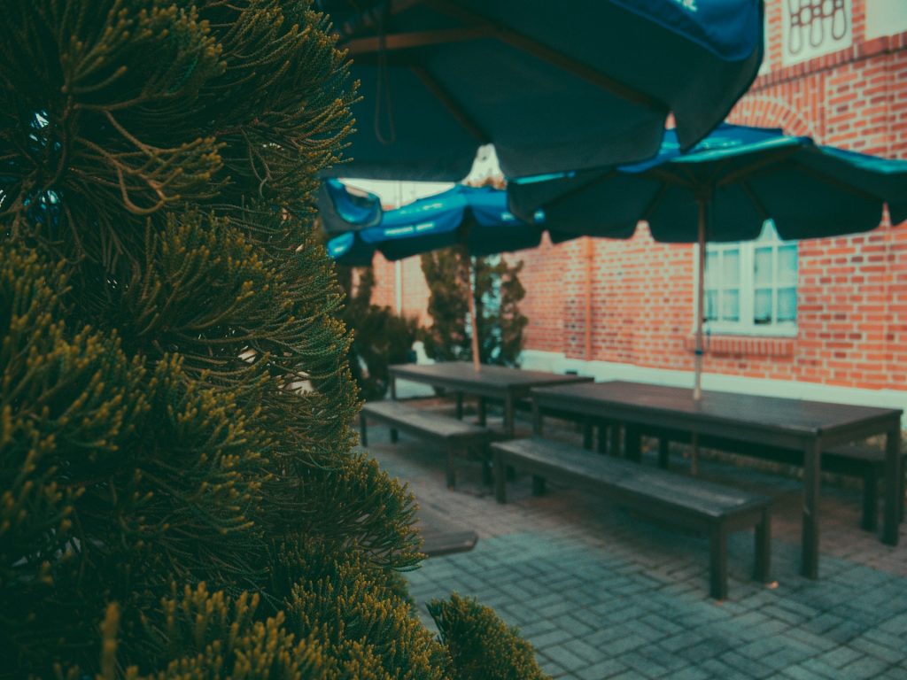 A couple outdoor picnic tables 